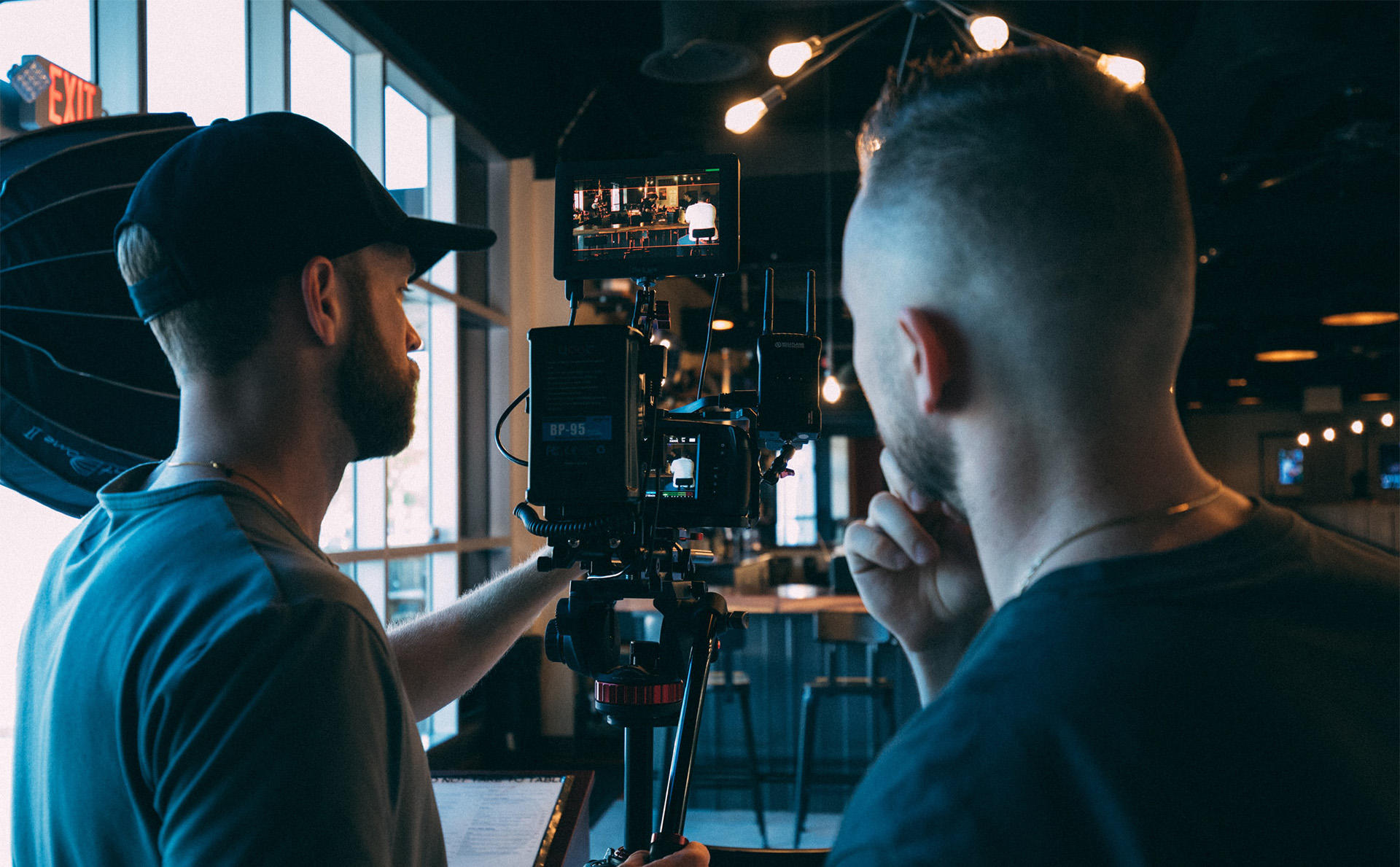 Two men working to produce a video for video marketing purposes.